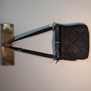 Tutilo New York Black Quilted Puffer Crossbody Bag.